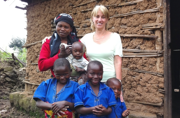 Judy McLean, an assistant professor in UBC’s faculty of land and food systems, with a Rwandan mother and her children. UNICEF and the government of Rwanda have invited a professor from the University of B.C. to expand a 12-month nutritional pilot study involving 1,100 children into a national program for nearly half a million toddlers aged six months to two years. 